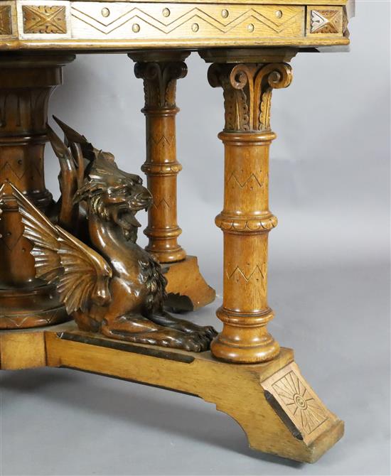 A Victorian Gothic revival golden oak centre table, Diam.4ft 2in. H.2ft 6in.